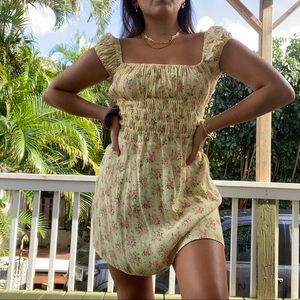 With Jéan Marseille Dress in bouquet of flowers